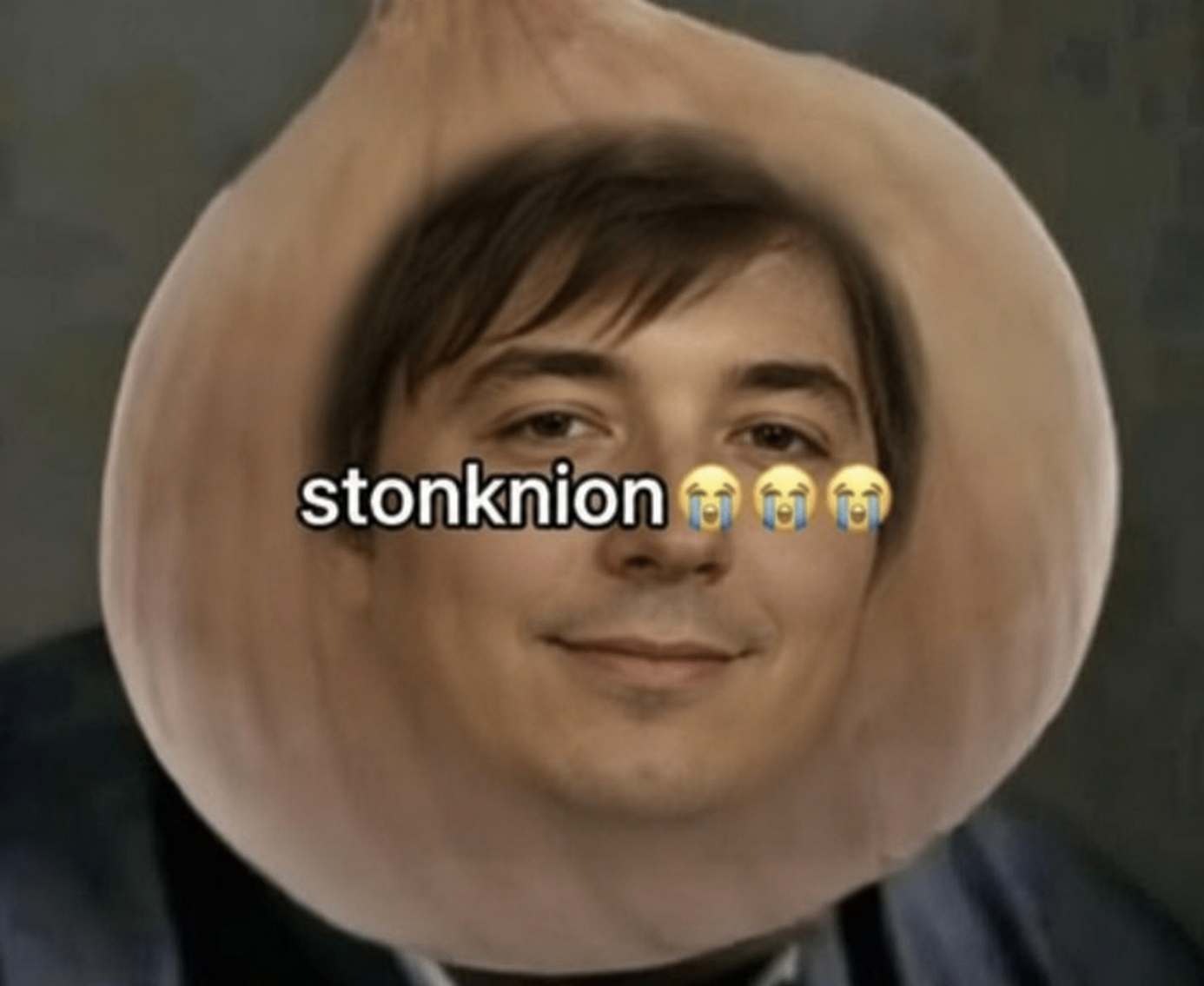 A man's face photoshopped inside an onion, captioned stonknion with crying emojis